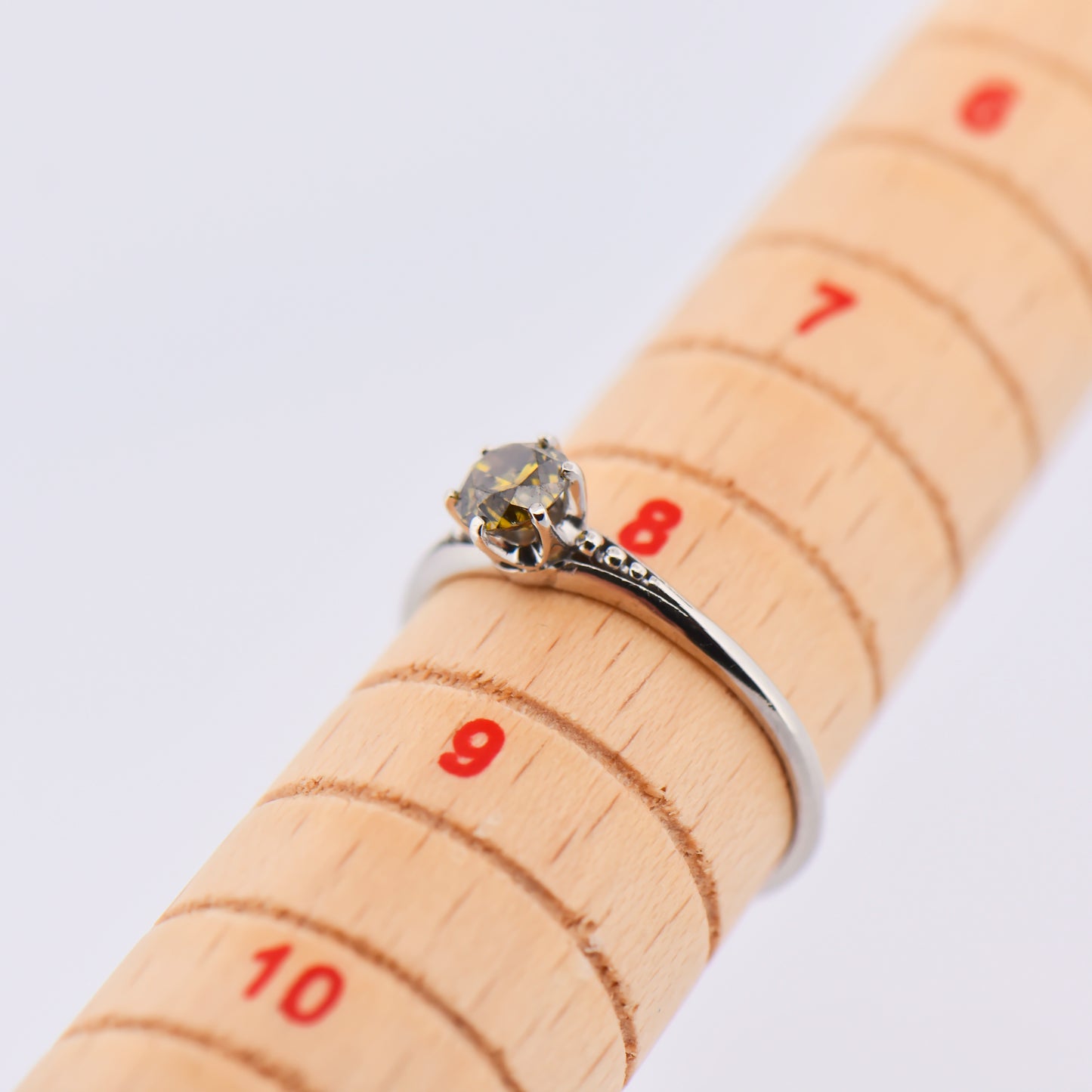 Antique Platinum Solitaire Ring with Olive Green Diamond