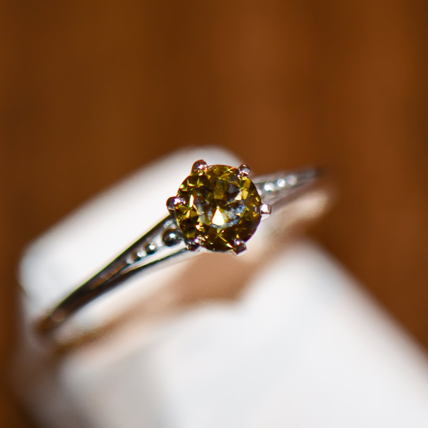 Antique Platinum Solitaire Ring with Olive Green Diamond