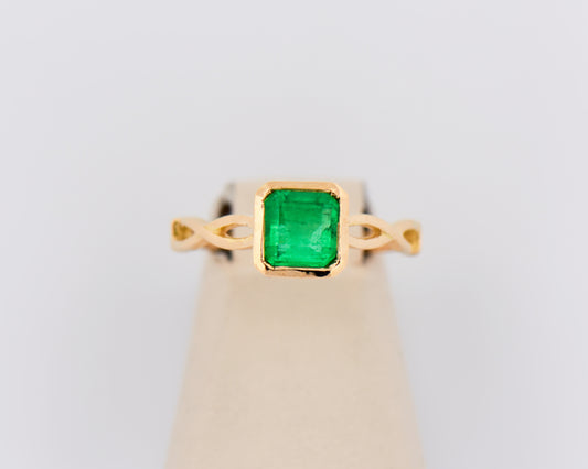 Bezel-Set Emerald Solitaire Engagement Ring in 18k