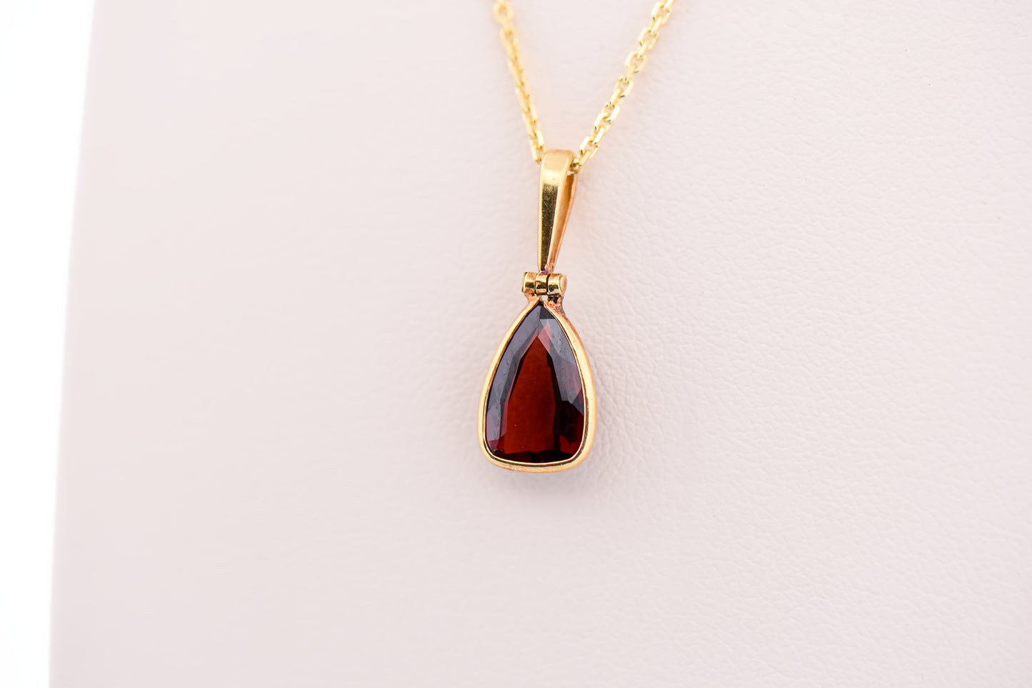 Bezel-Set Red Garnet Pendant in 18k Yellow Gold