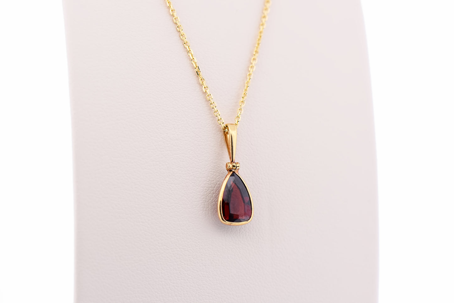 Bezel-Set Red Garnet Pendant in 18k Yellow Gold