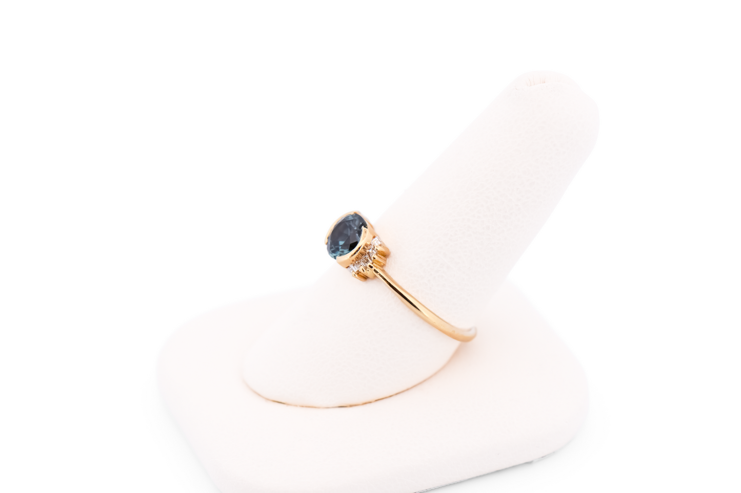 Bezel-Set Teal Montana Sapphire Engagement Ring with Baguette Diamonds
