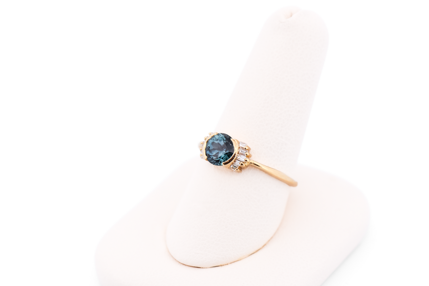 Bezel-Set Teal Montana Sapphire Engagement Ring with Baguette Diamonds