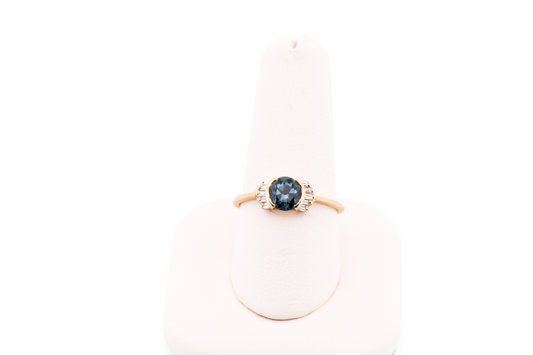 Bezel-Set Teal Montana Sapphire Engagement Ring with Baguette Diamonds