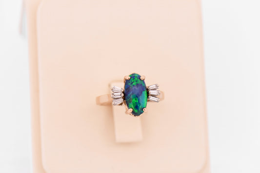 Blue-Green Black Opal Engagement Ring with Baguette Diamonds