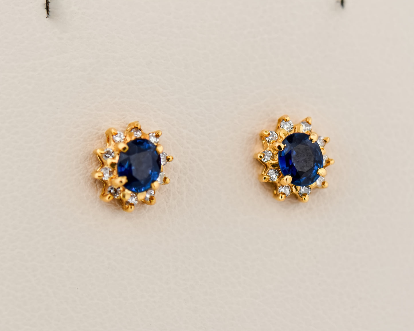 Blue Sapphire Halo Stud Earrings in Yellow Gold