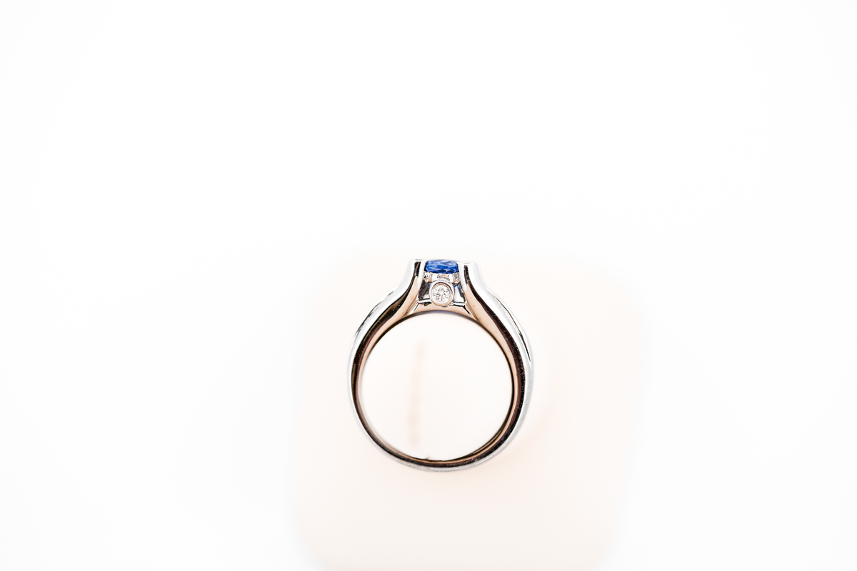 Blue Sapphire Ring with Diamond Prongs in White Gold