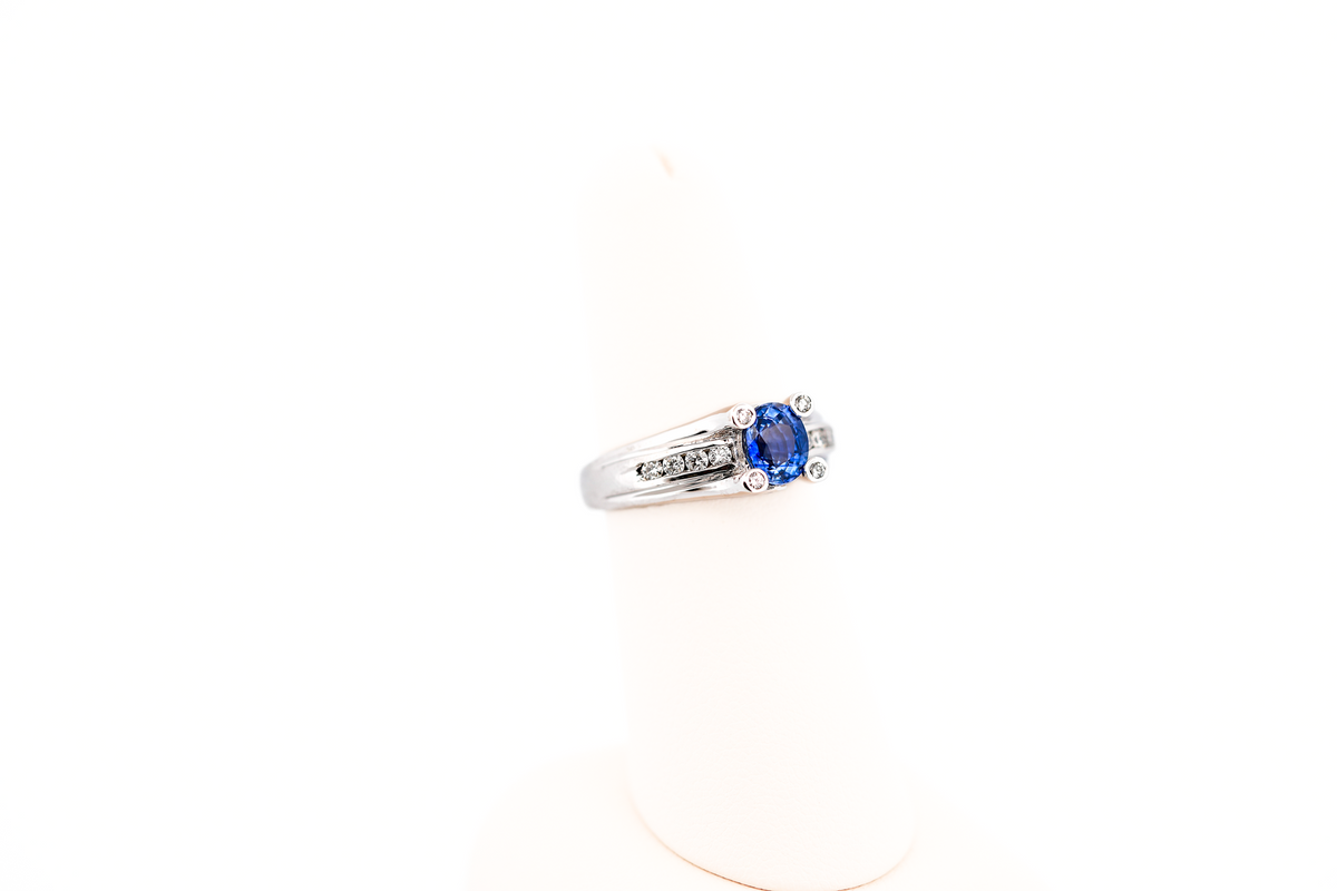 Blue Sapphire Ring with Diamond Prongs in White Gold