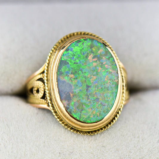 Top Quality Boulder Opal Set in Rope-Style Gold Ring