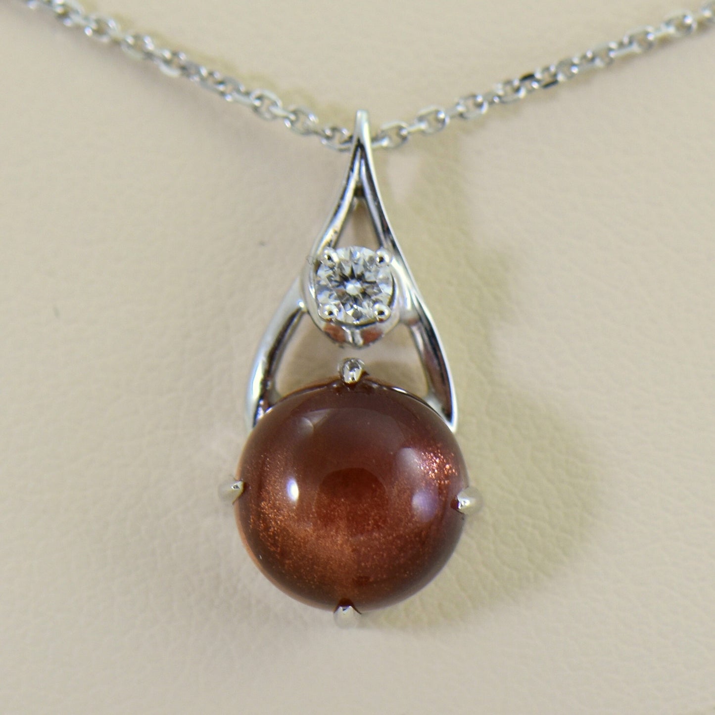 Cabochon Sunstone & Diamond Pendant