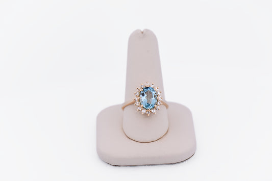 Classic Oval Aquamarine & Diamond Halo Ring in Yellow Gold
