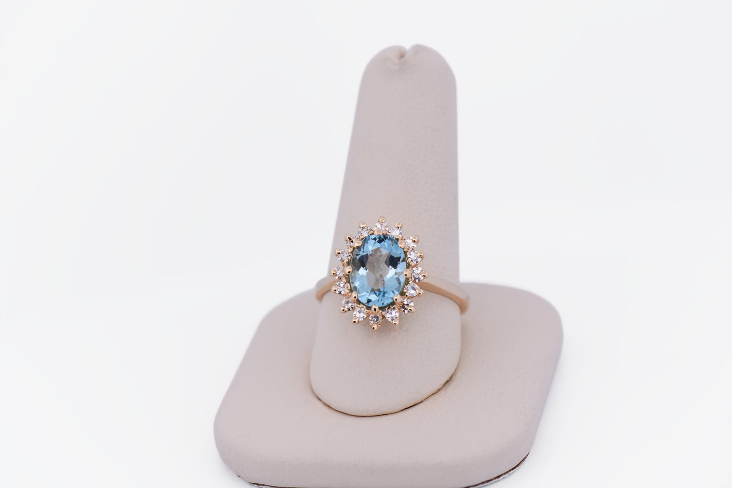 Classic Oval Aquamarine & Diamond Halo Ring in Yellow Gold
