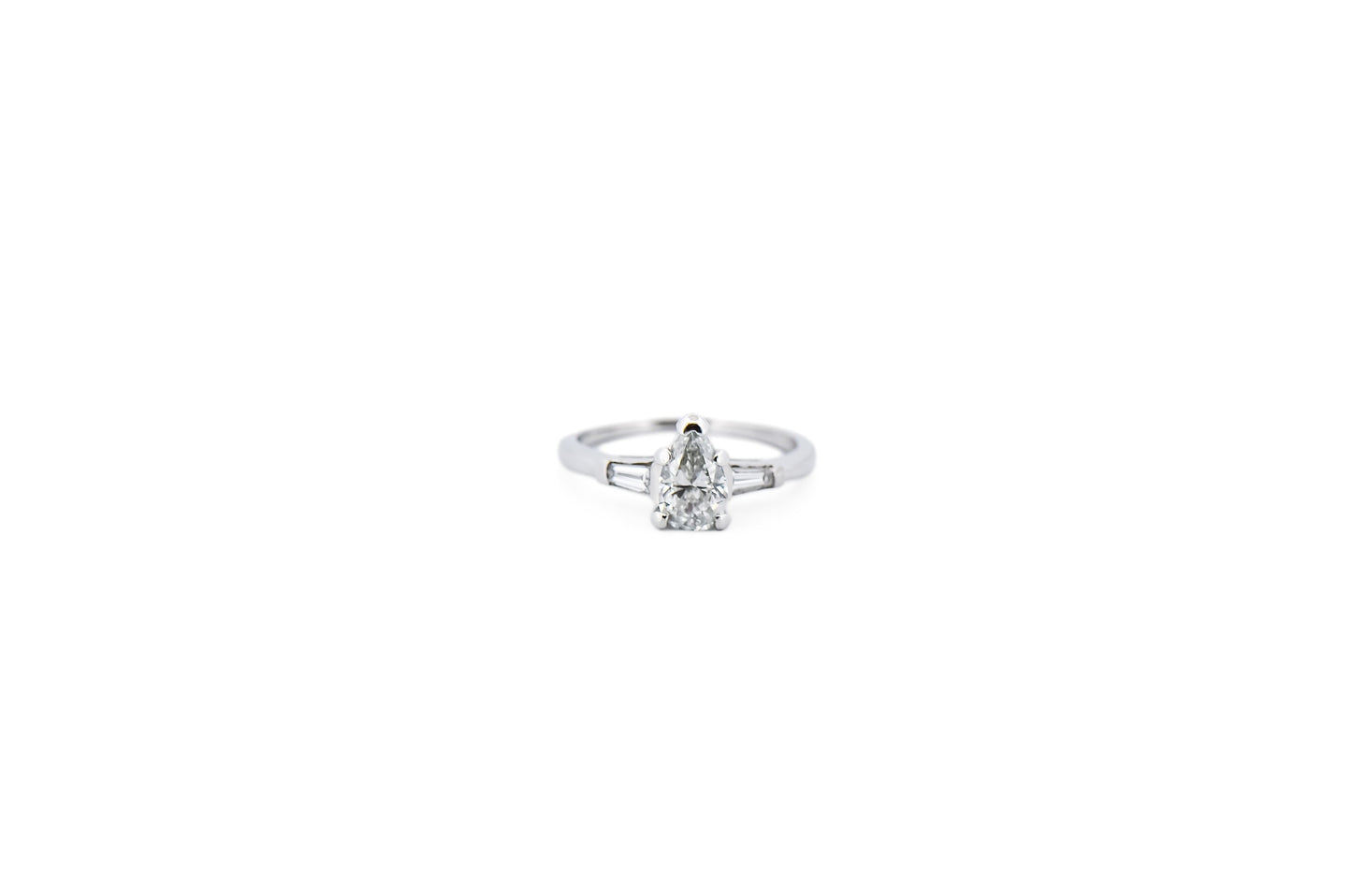 Classic Pear Shape Diamond Engagement Ring with Baguette Accents in Platinum