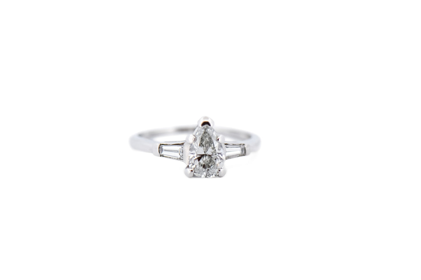Classic Pear Shape Diamond Engagement Ring with Baguette Accents in Platinum