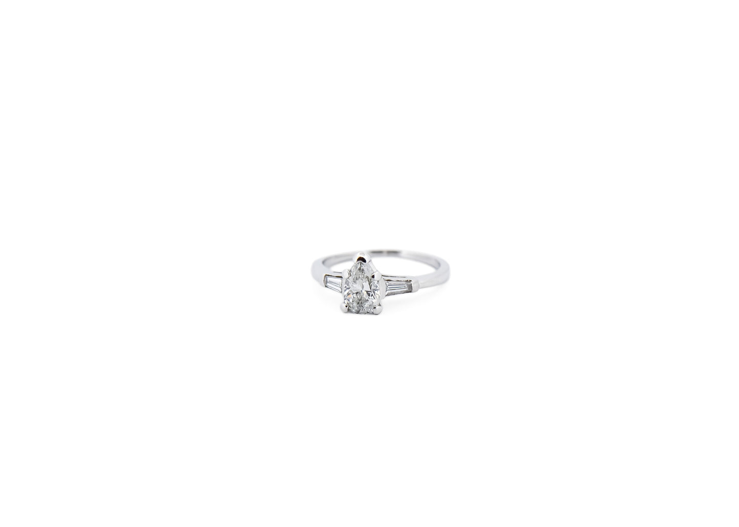 Classic Pear Shape Diamond Engagement Ring with Baguette Accents in Platinum