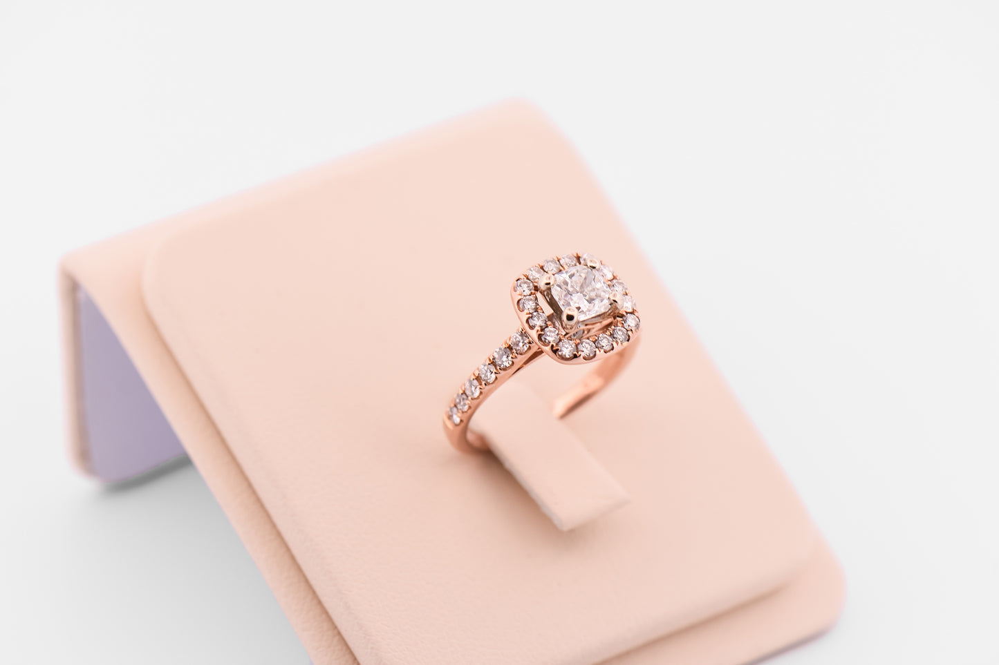 Cushion Cut Diamond Halo Engagement Ring in Rose Gold