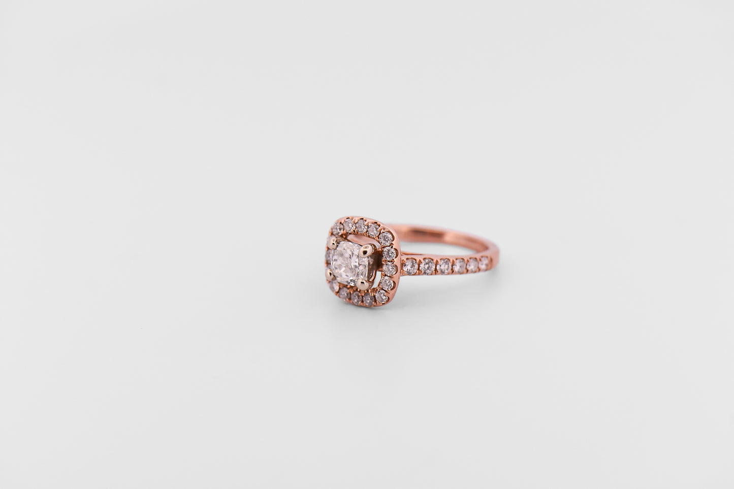 Cushion Cut Diamond Halo Engagement Ring in Rose Gold