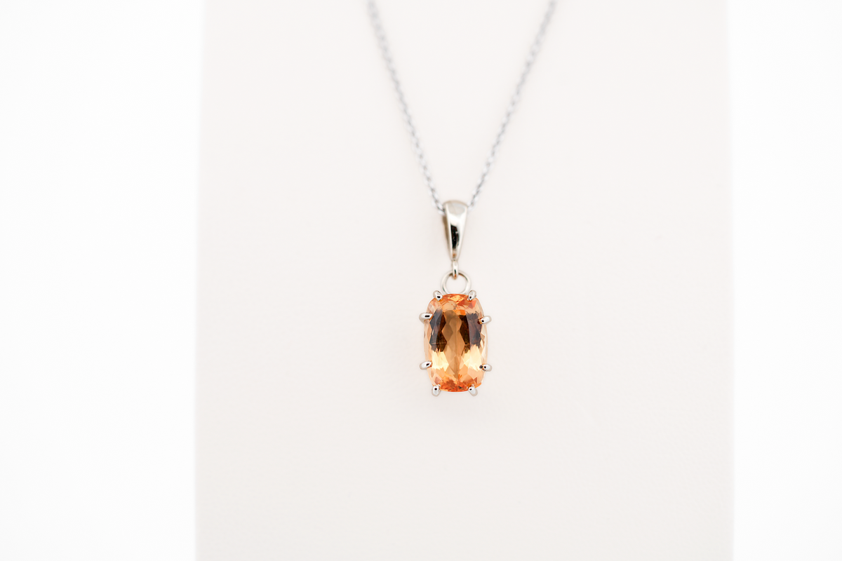 Cushion Cut Imperial Topaz Solitaire Pendant in 14k White Gold