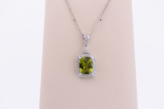 Cushion Cut Peridot Pendant with Diamond Halo in White Gold