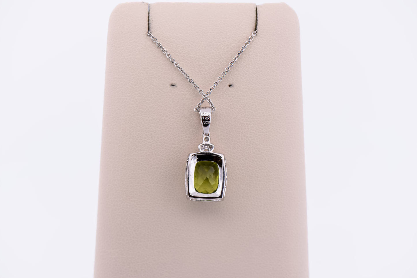 Cushion Cut Peridot Pendant with Diamond Halo in White Gold