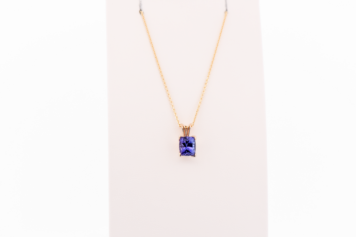 Cushion-Cut Tanzanite Solitaire Pendant in Yellow Gold