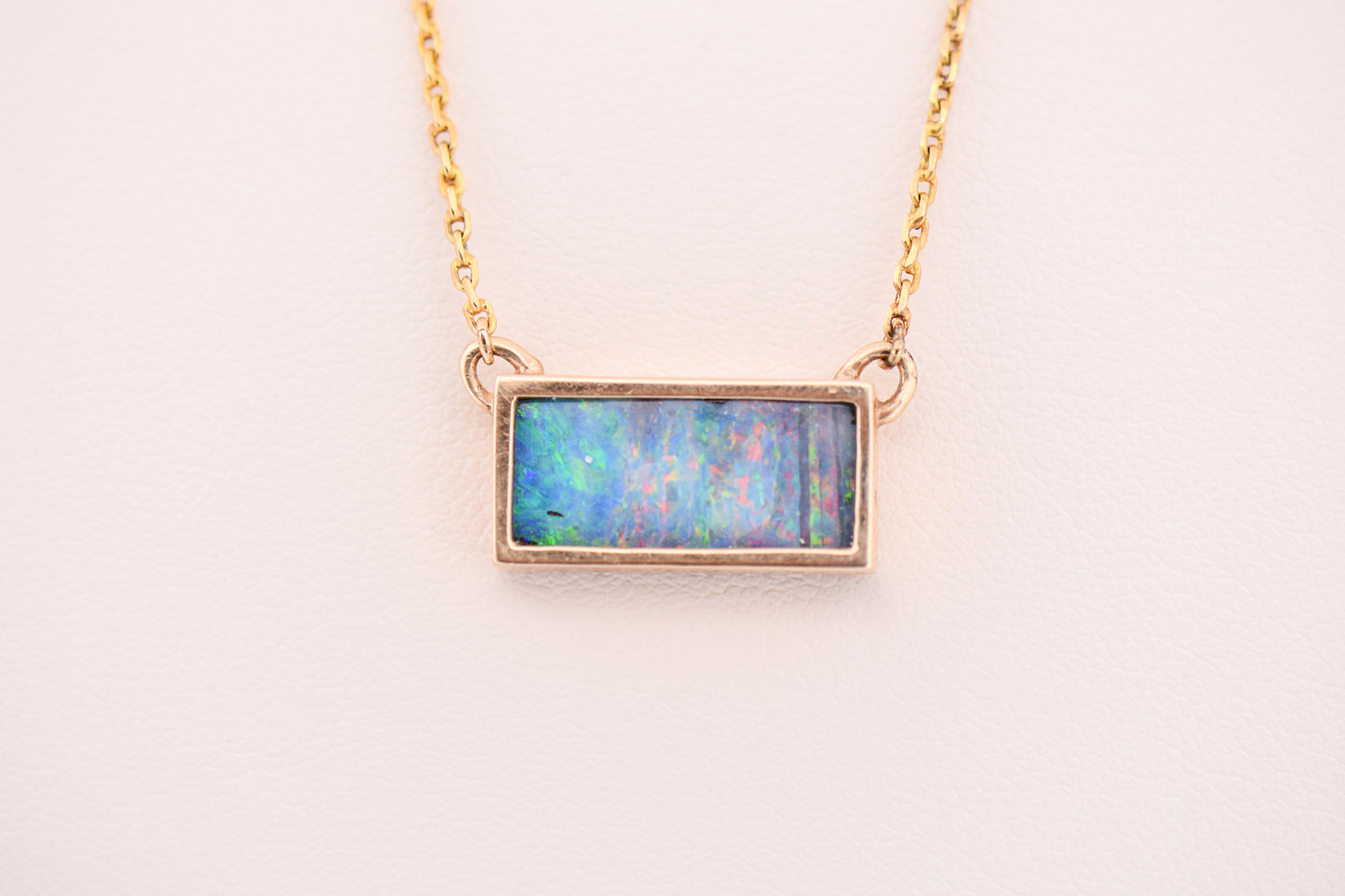 Custom Bezel-Set Rectangular Boulder Opal Necklace in Yellow Gold
