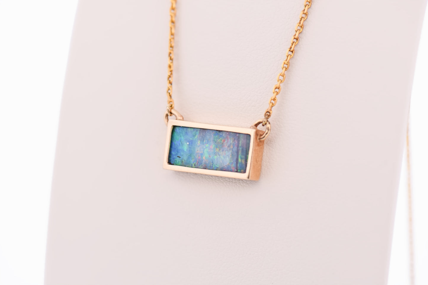 Custom Bezel-Set Rectangular Boulder Opal Necklace in Yellow Gold