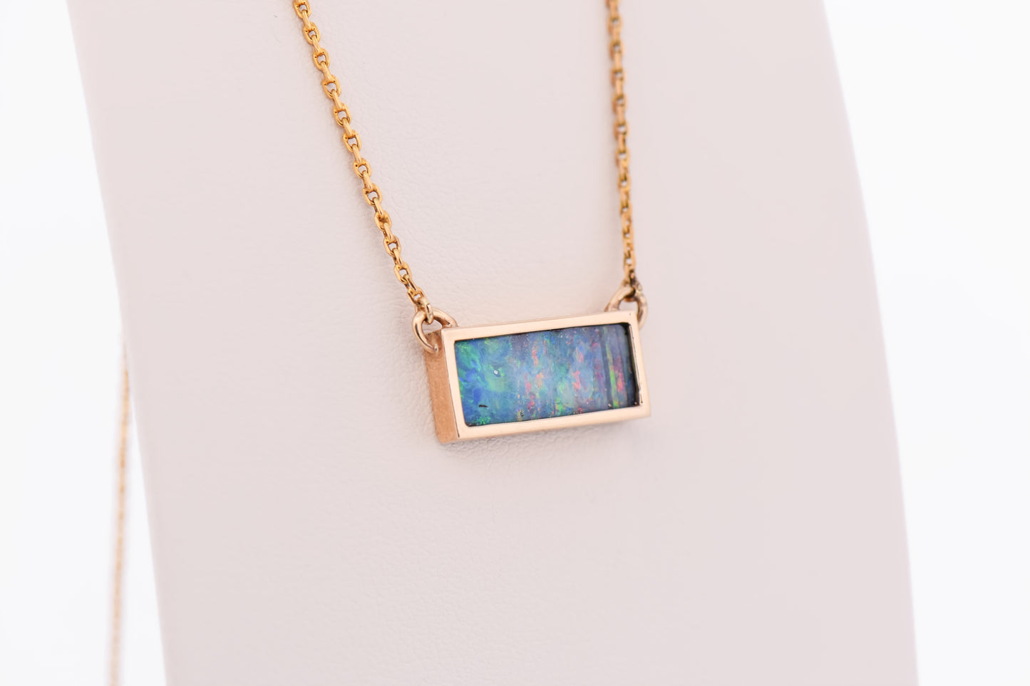 Custom Bezel-Set Rectangular Boulder Opal Necklace in Yellow Gold