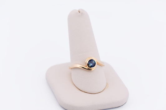 Custom Bezel Set Sapphire Swirl Engagement Ring in Yellow Gold