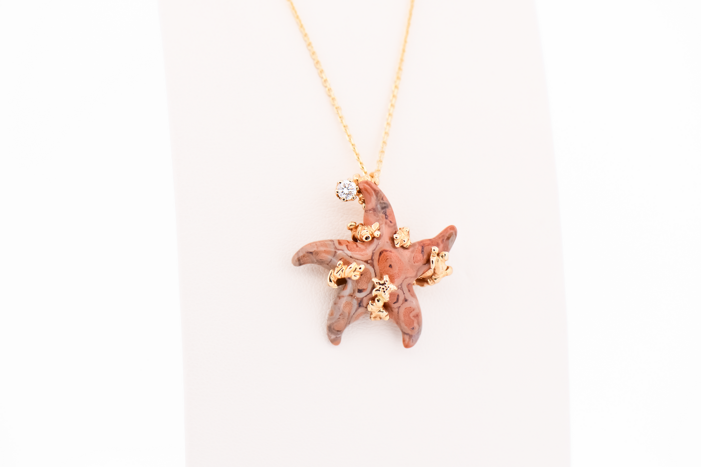 Custom Pendant with Carved Fossilized Coral Starfish in Textured Yellow Gold