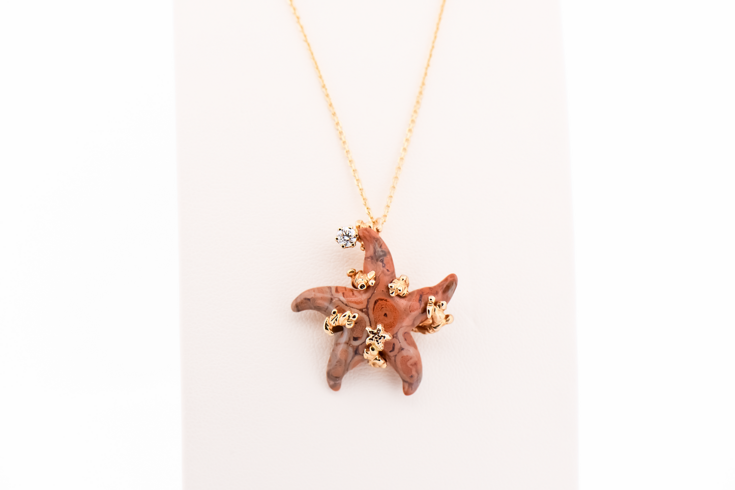 Custom Pendant with Carved Fossilized Coral Starfish in Textured Yellow Gold