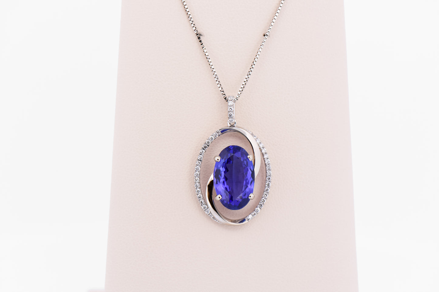 Custom Swirl Pendant with Old-Stock 6ct Tanzanite & Diamonds