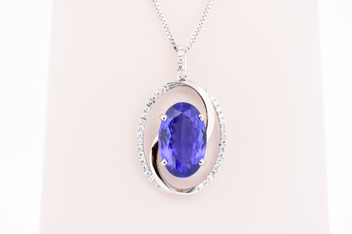 Custom Swirl Pendant with Old-Stock 6ct Tanzanite & Diamonds