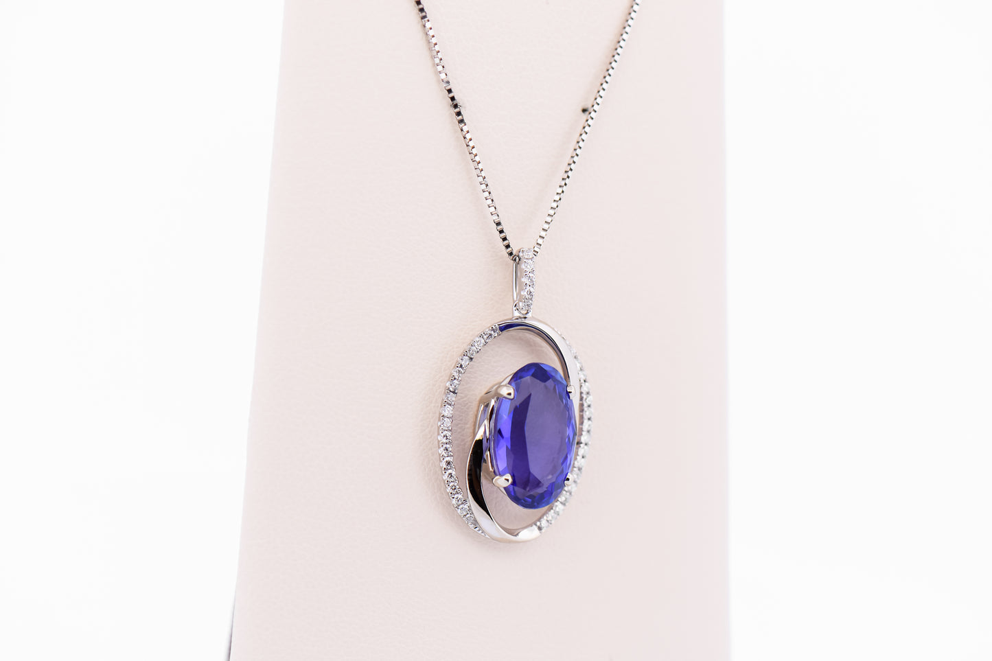 Custom Swirl Pendant with Old-Stock 6ct Tanzanite & Diamonds