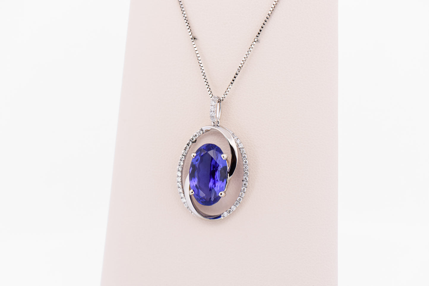 Custom Swirl Pendant with Old-Stock 6ct Tanzanite & Diamonds