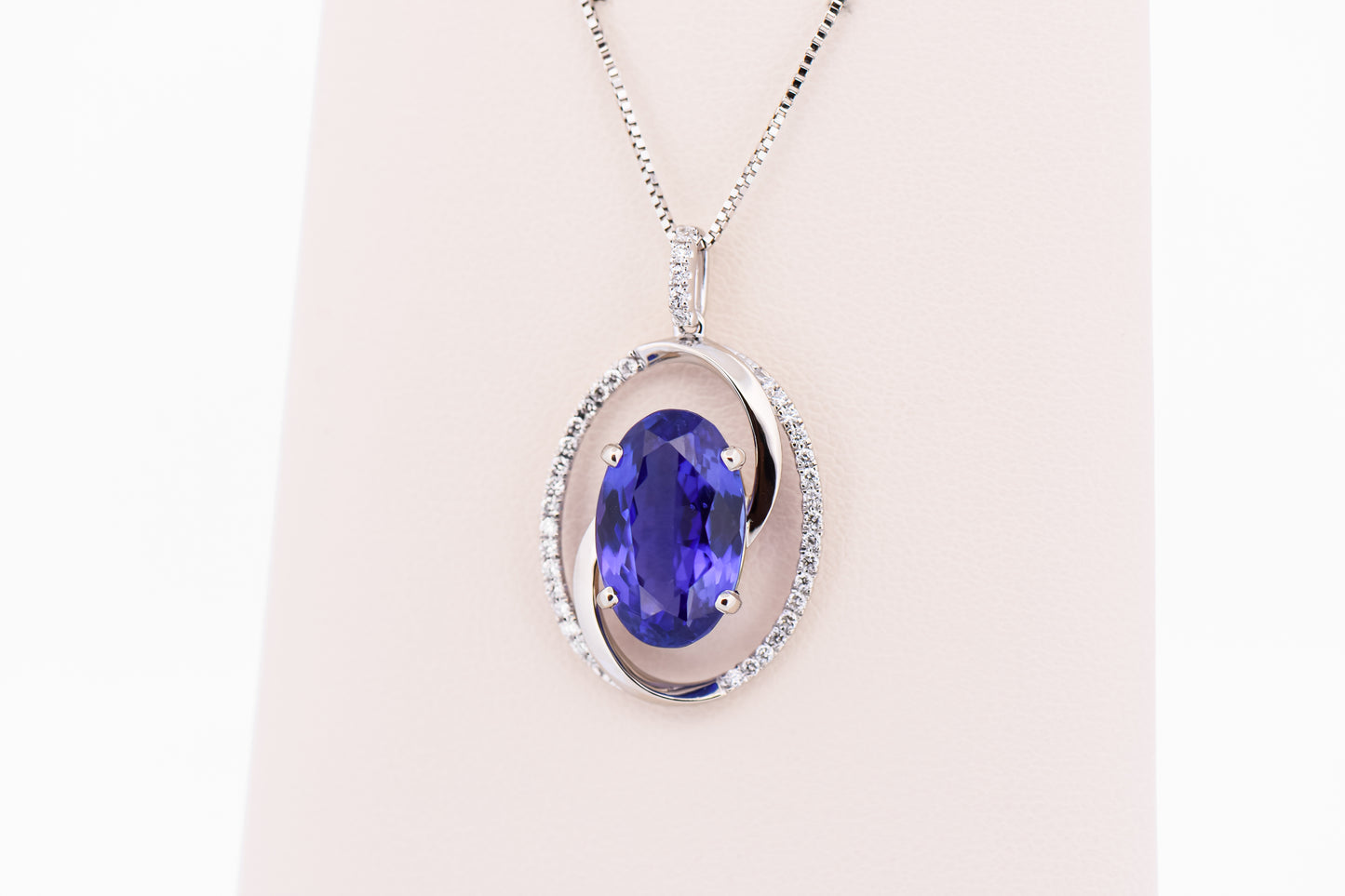 Custom Swirl Pendant with Old-Stock 6ct Tanzanite & Diamonds