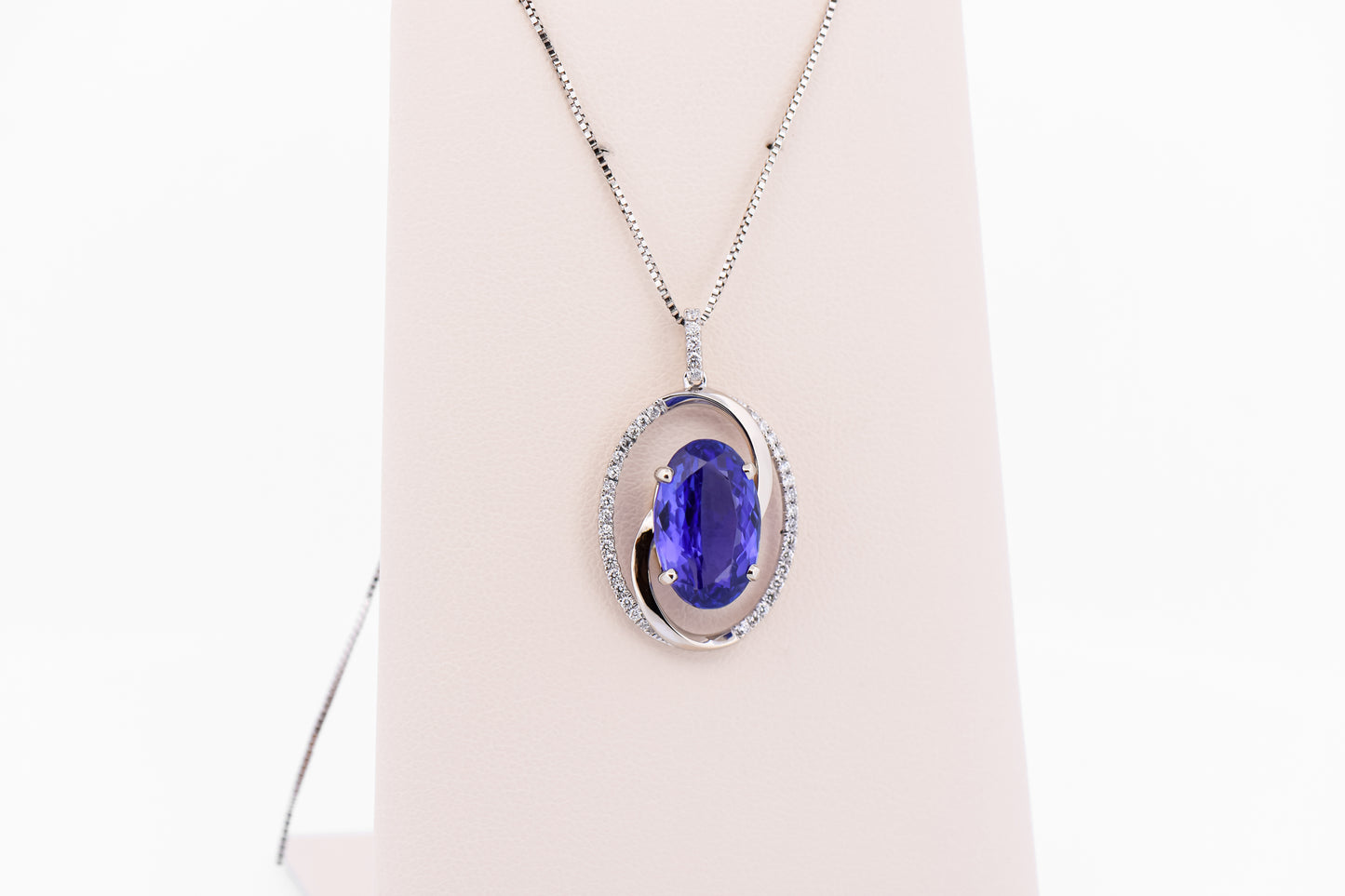 Custom Swirl Pendant with Old-Stock 6ct Tanzanite & Diamonds