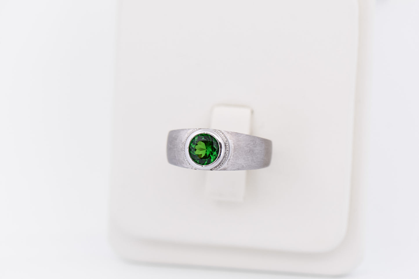 Custom White Gold Ring with Bezel-Set Tsavorite Garnet