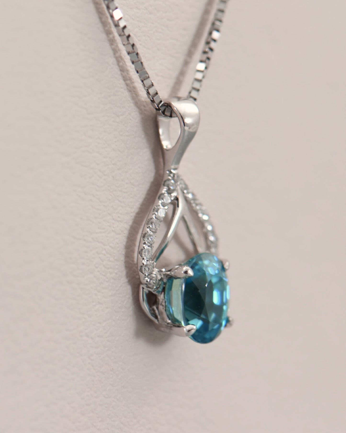 Dainty Deep Blue Zircon & Diamond Pendant in White Gold