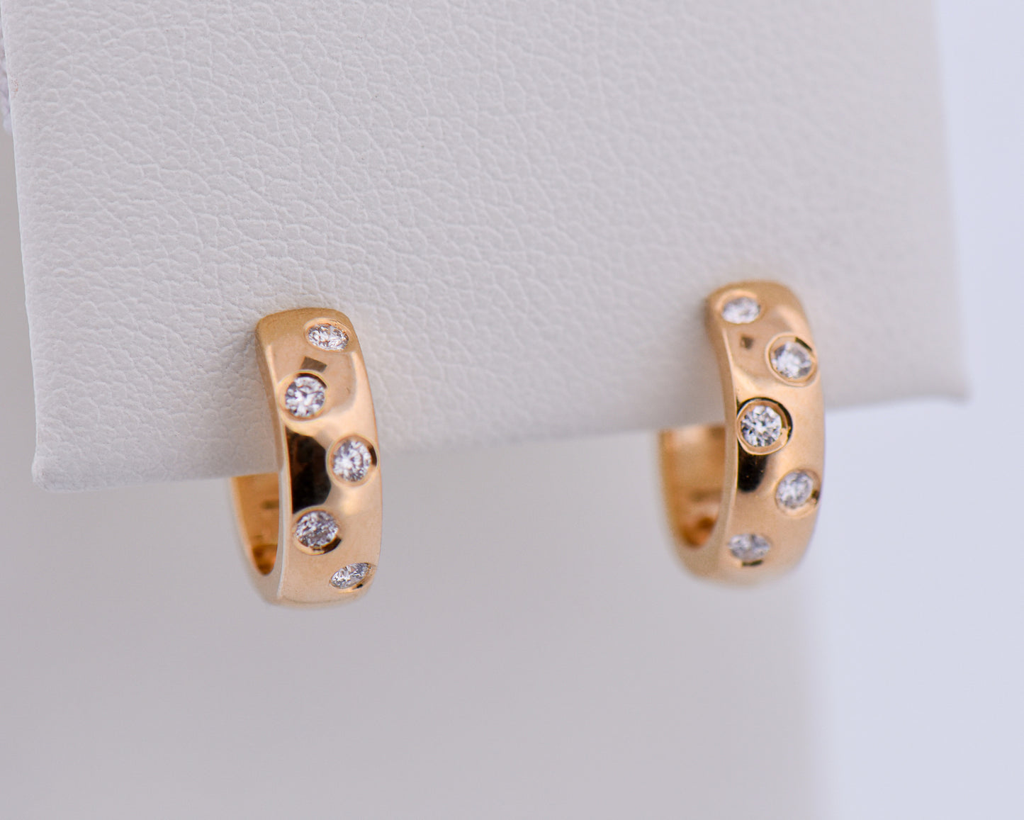 Etoile Diamond Huggie Hoops in Yellow Gold
