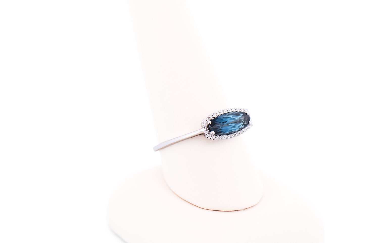 East-West Blue Topaz and Diamond Halo Ring