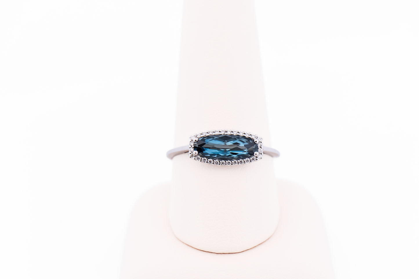 East-West Blue Topaz and Diamond Halo Ring