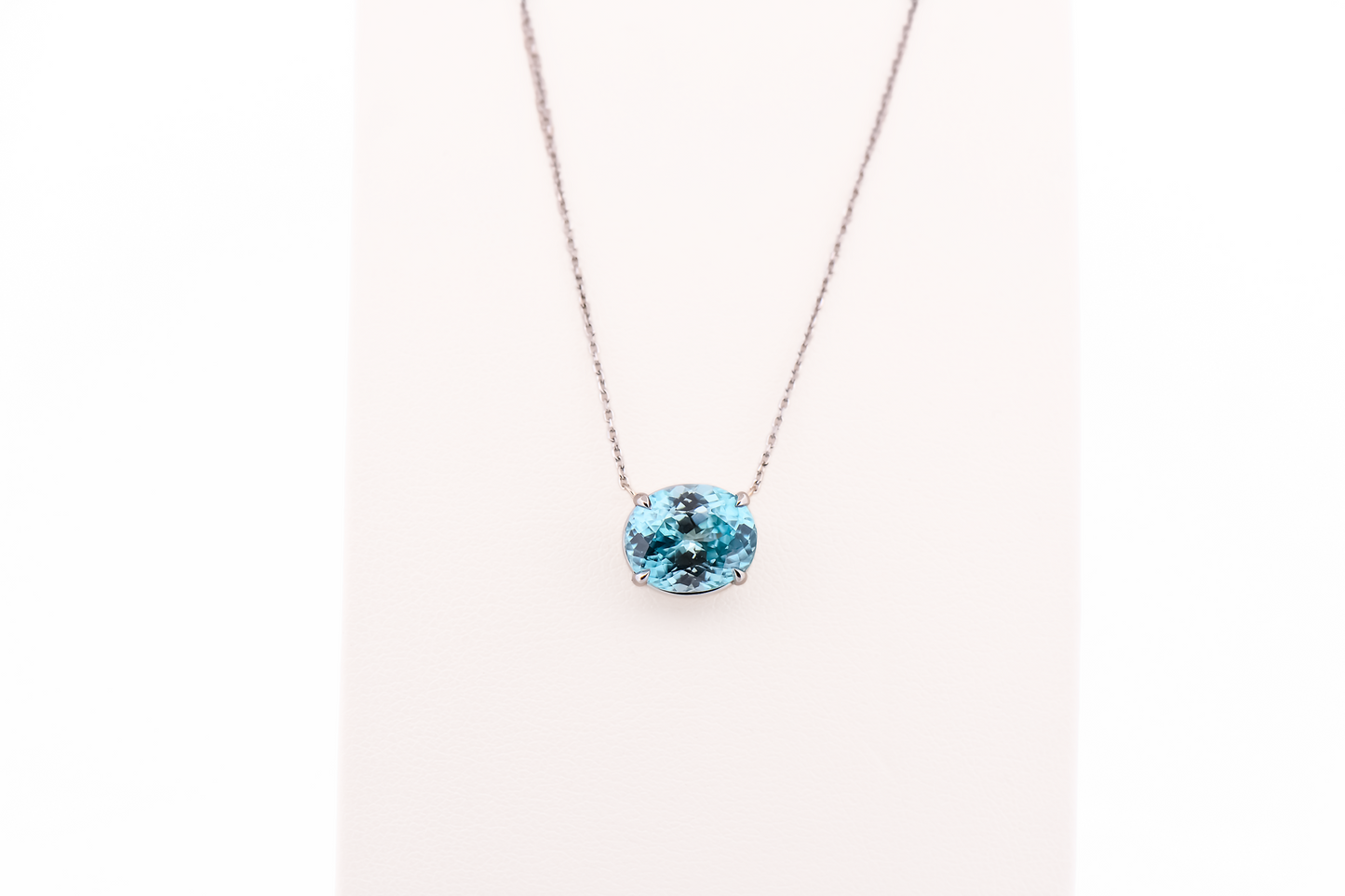 East-West Blue Zircon Solitaire Pendant in 14k White Gold