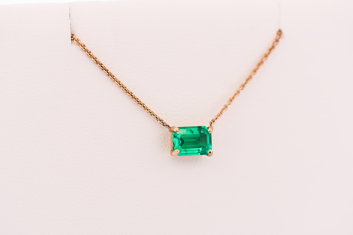 Elegant 1ct Emerald Cut Emerald Necklace in Yellow Gold