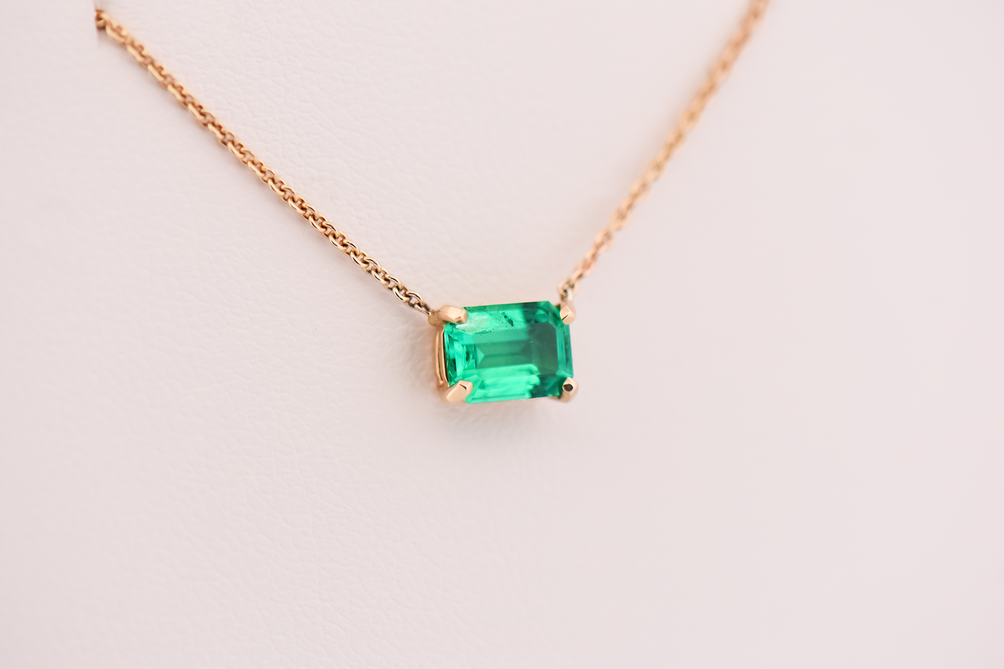 Elegant 1ct Emerald Cut Emerald Necklace in Yellow Gold