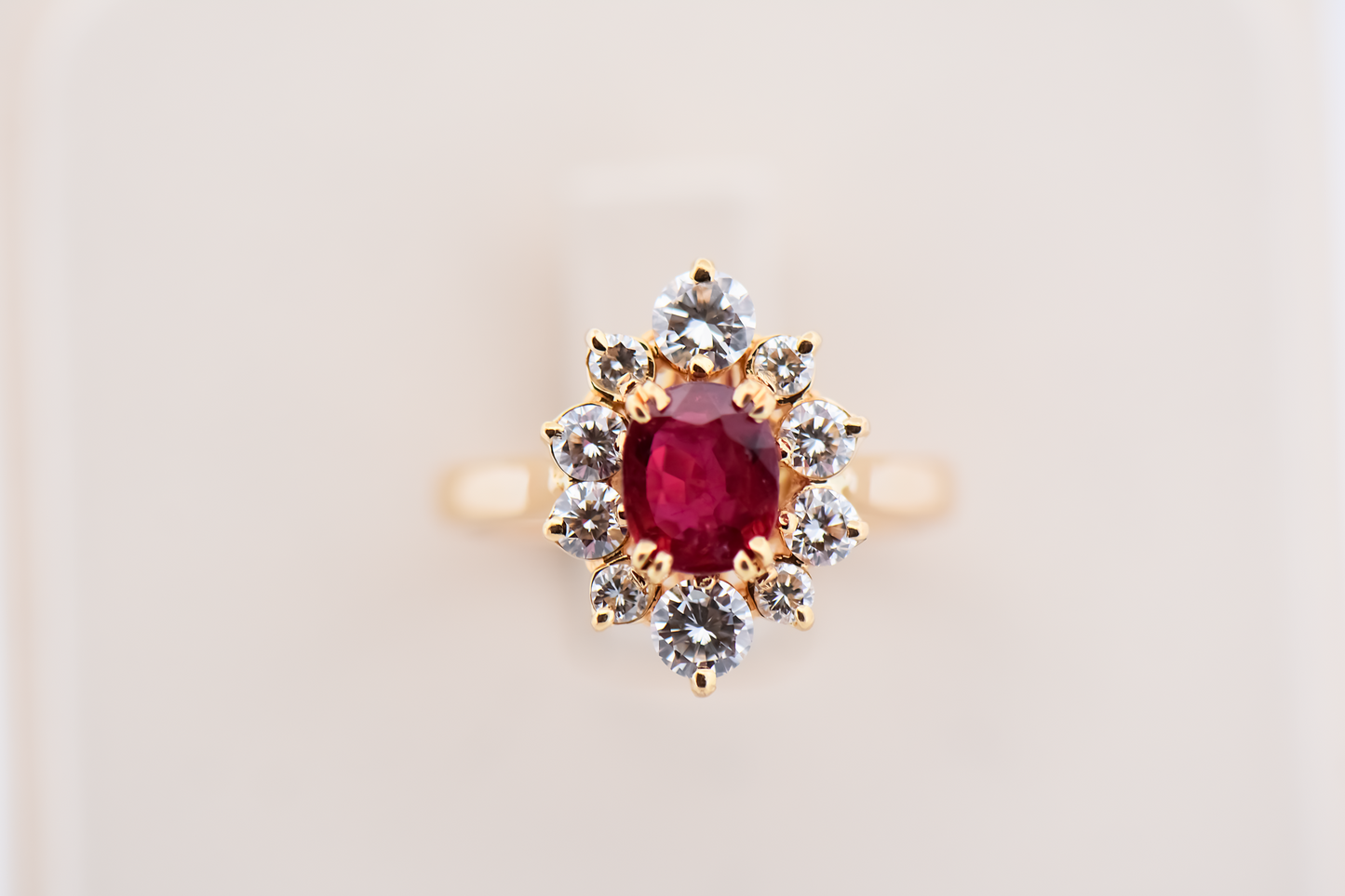 Elegant Oval Ruby & Diamond Halo Ring in 18k Gold
