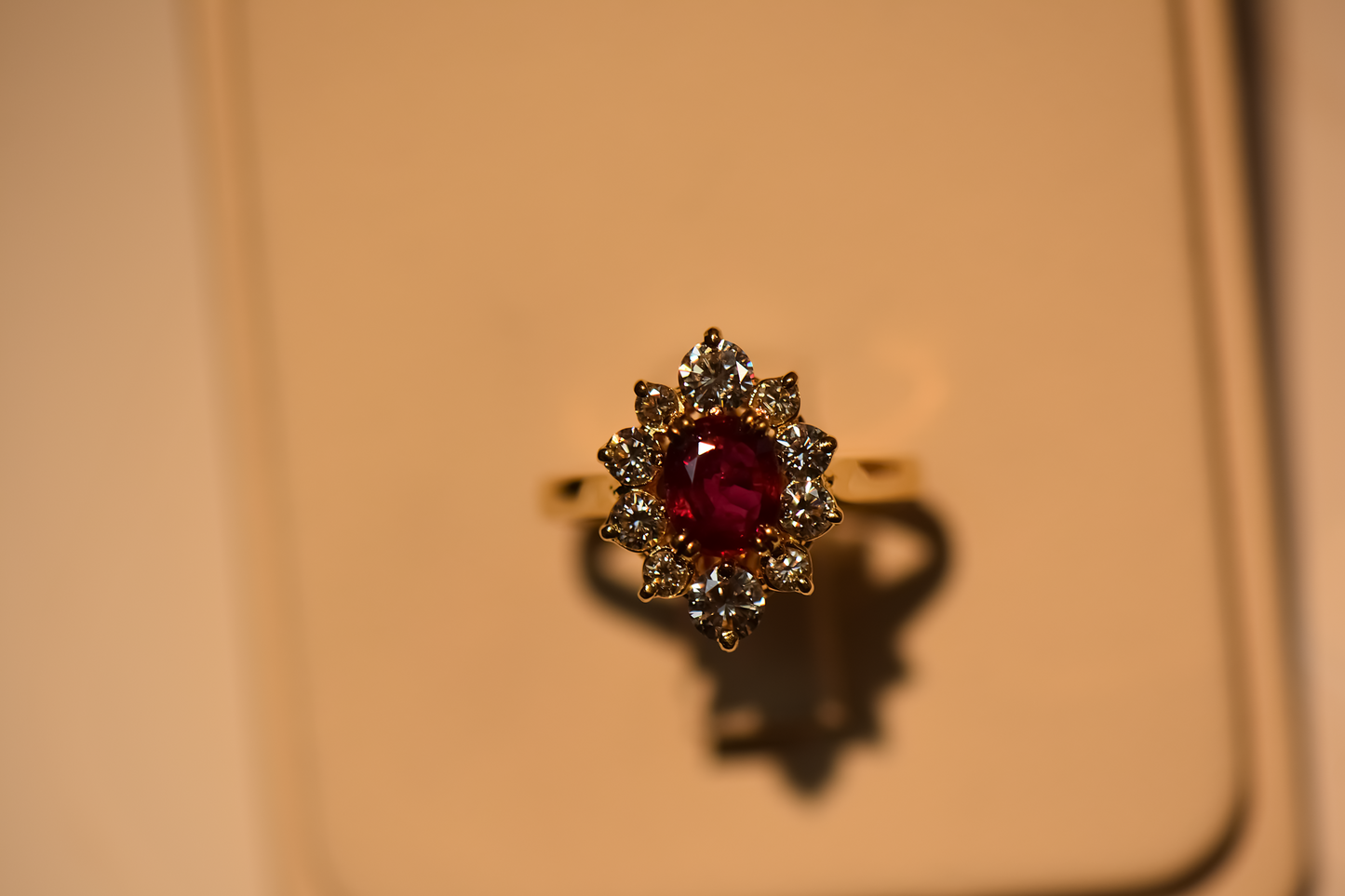 Elegant Oval Ruby & Diamond Halo Ring in 18k Gold