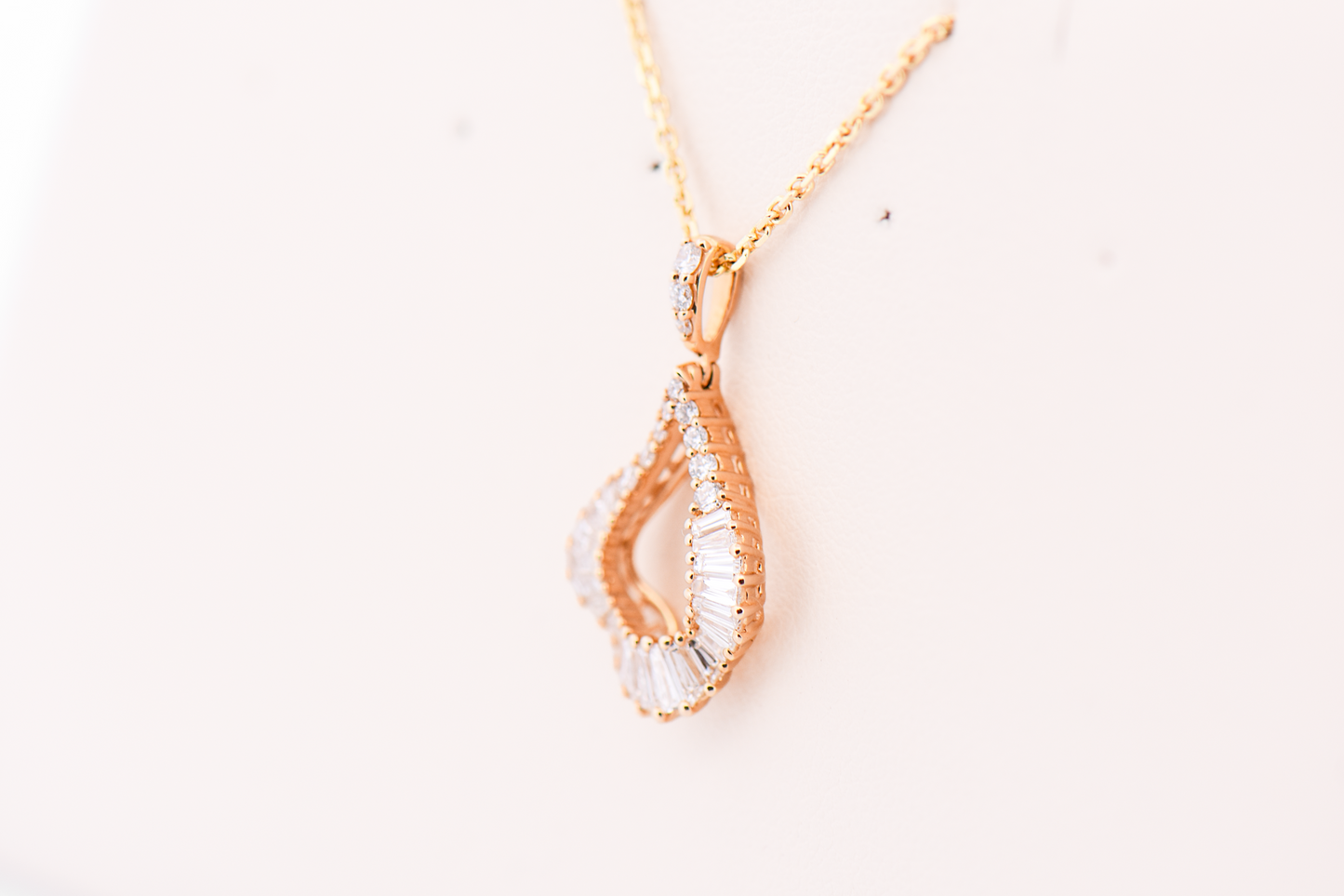 Elegant Yellow Gold Tear Drop Pendant with Round & Baguette Diamonds