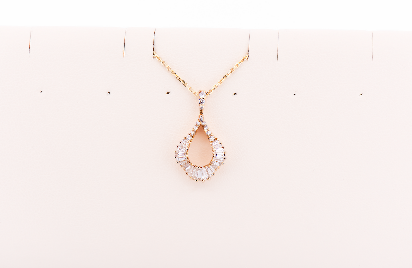 Elegant Yellow Gold Tear Drop Pendant with Round & Baguette Diamonds