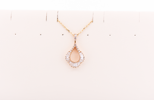 Elegant Yellow Gold Tear Drop Pendant with Round & Baguette Diamonds